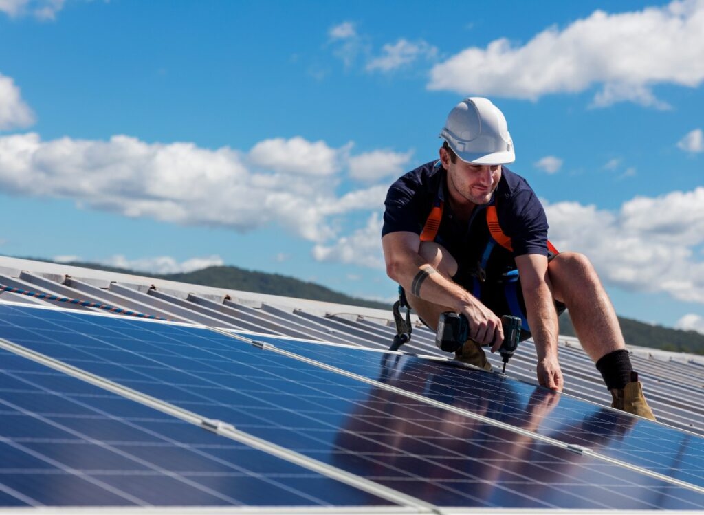 contractor installing solar panels on a roof atrascadero ca